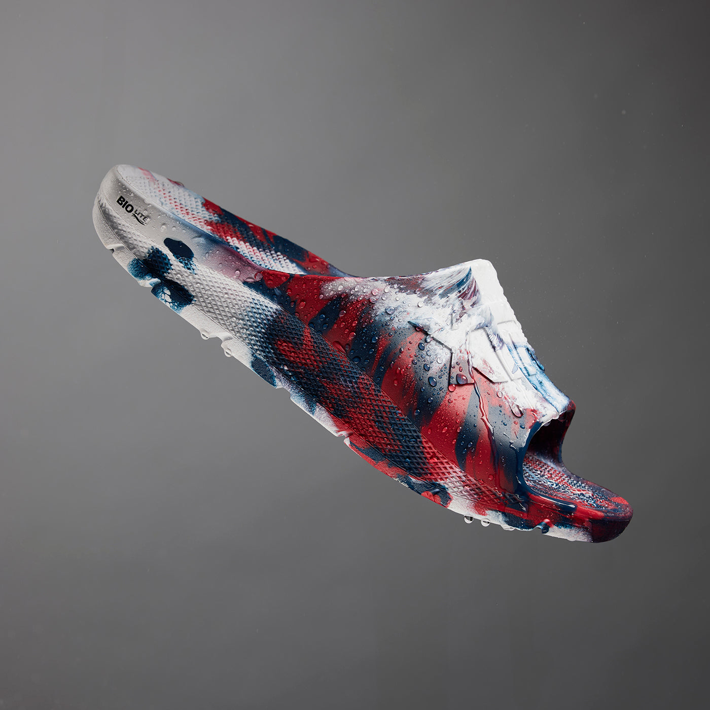 Red, White, and Blue Swirl Men's Après Fish Slide Main View.